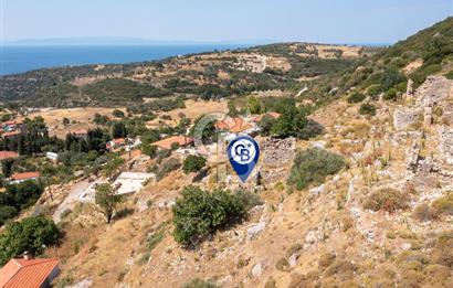 Karaburun Bozköy'de Full Deniz Manzaralı Kargir Ev ve Arsası