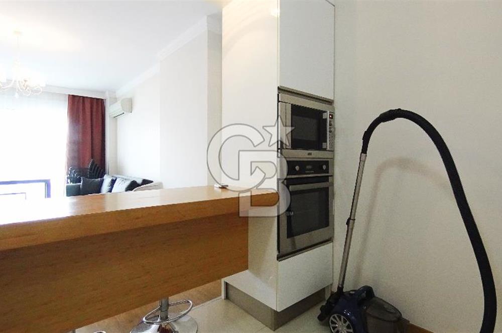 Mavişehir Modern 1 de Havuz Cepheli Eşyalı 1+1 Kiralık Daire