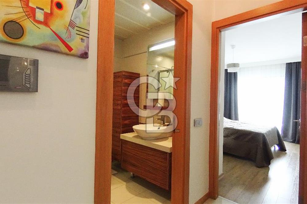 Mavişehir Modern 1 de Havuz Cepheli Eşyalı 1+1 Kiralık Daire