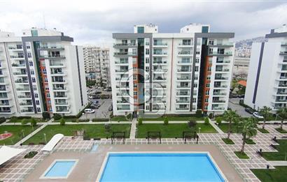 Mavişehir Modern 1 de Havuz Cepheli Eşyalı 1+1 Kiralık Daire