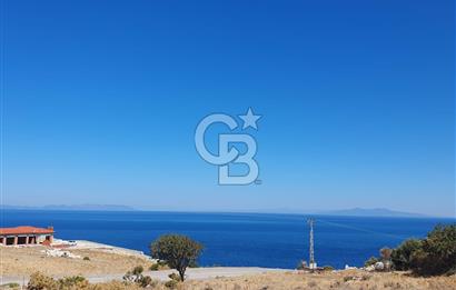 Karaburun'da Resmi Yola Cepheli Deniz Manzaralı 6074 m2 Arazi