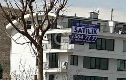 TÜRKKONUT BULVARI 3346. CADDEDE  İKİZ YARISI SATILIK BİNA