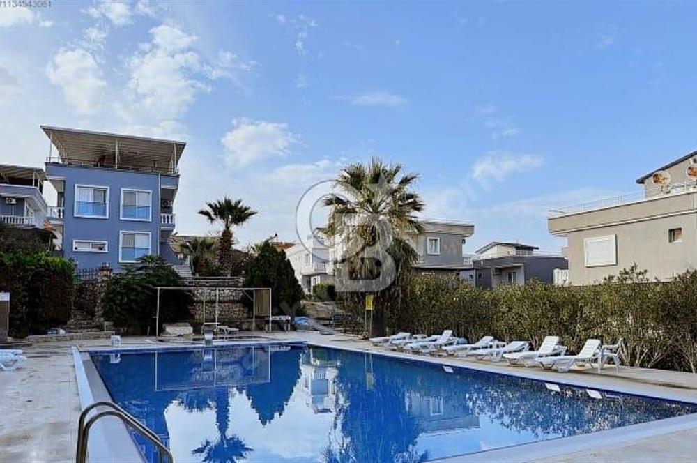 Seferihisar Sığacık'da Havuzlu Site içinde Satılık 3+1 villa