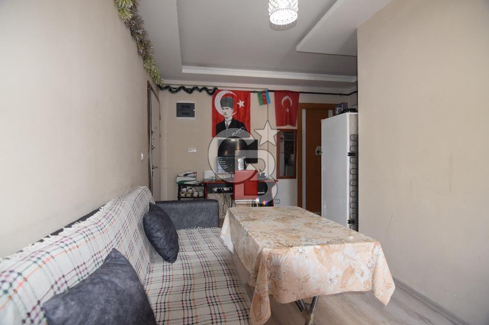 BUCA KURUÇEŞME MAHALLESİ'NDE SATILIK 1+1 DAİRE