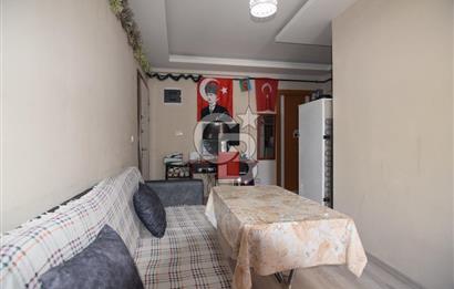 BUCA KURUÇEŞME MAHALLESİ'NDE SATILIK 1+1 DAİRE