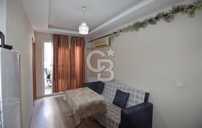 BUCA KURUÇEŞME MAHALLESİ'NDE SATILIK 1+1 DAİRE