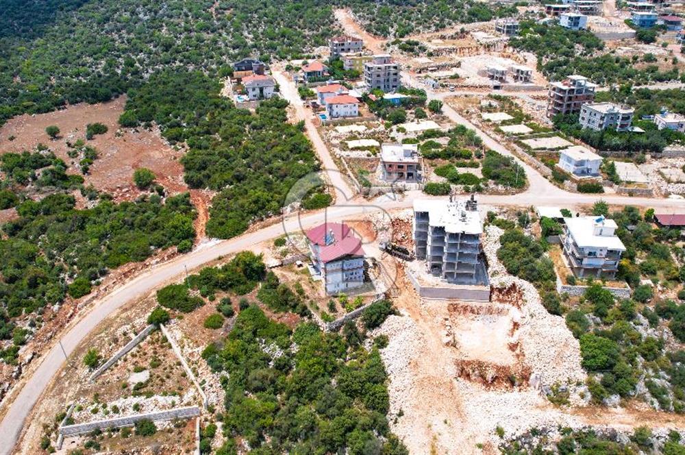 ANTALYA DEMRE BOZDAĞ'DA ÖNÜ KAPANMAZ DENİZ MANZARALI ARSA VE BİNASI