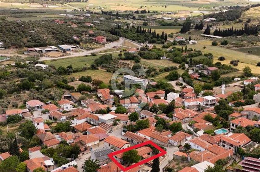 FOÇA ILIPINARDA SATILIK ÇELİK KARKAS ÜZERİNE TAŞ EV VE 62m2 ARSA