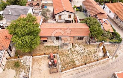 FOÇA ILIPINARDA SATILIK ÇELİK KARKAS ÜZERİNE TAŞ EV VE 62m2 ARSA