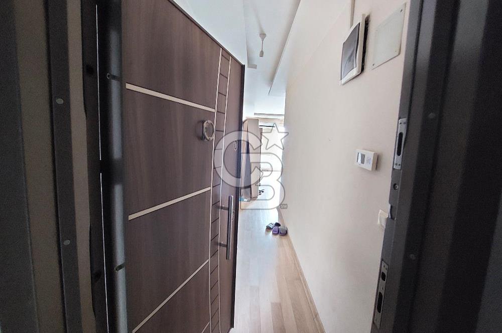 BORNOVA KIZILAY MAHALLESİNDE ARA KAT SATILIK EŞYALI 1+1 DAİRE