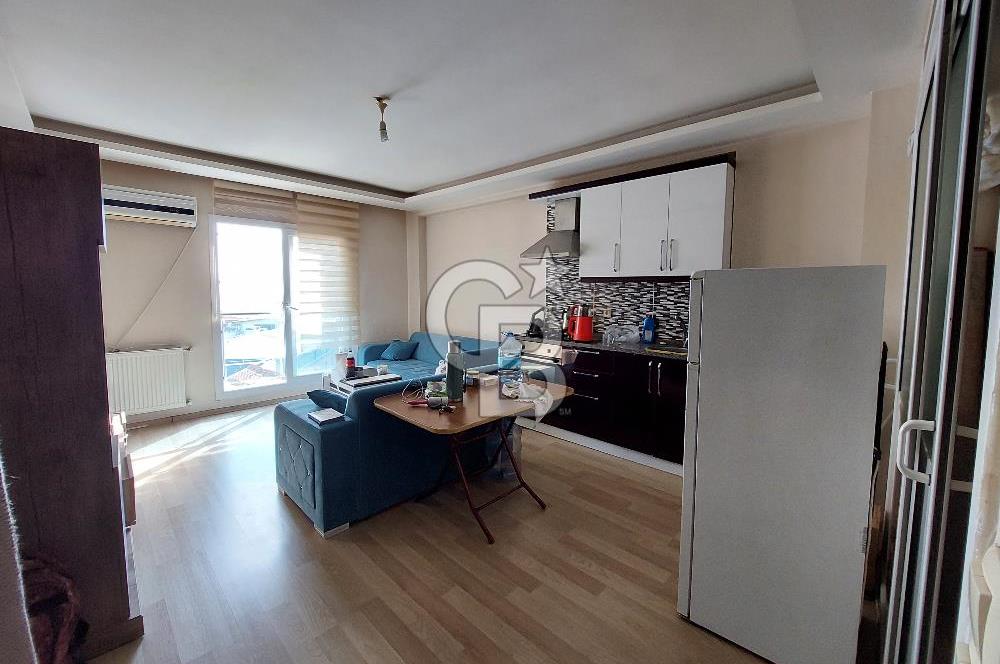 BORNOVA KIZILAY MAHALLESİNDE ARA KAT SATILIK EŞYALI 1+1 DAİRE