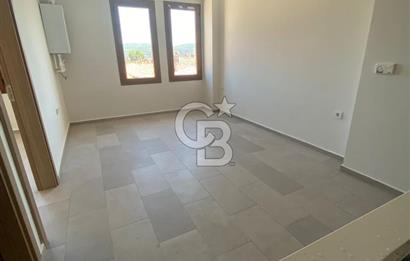 MUĞLA MERKEZDE SIFIR 1+1 BİNADA KULLANIŞLI MANZARALI KİRALIK DAİRE