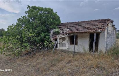 TORBALI DEMİRCİ KÖYÜNDE İÇİNDE KAYITLI EVİ OLAN SATILIK 10.130 M² ARAZİ