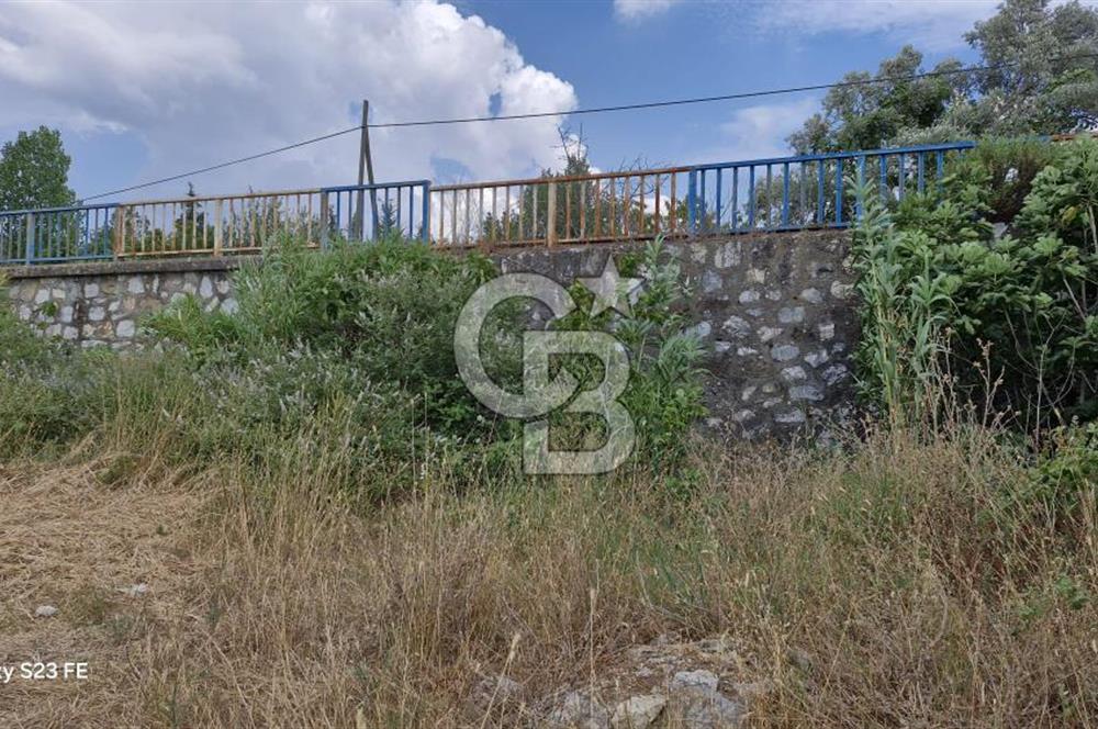 TORBALI DEMİRCİ KÖYÜNDE İÇİNDE KAYITLI EVİ OLAN SATILIK 10.130 M² ARAZİ