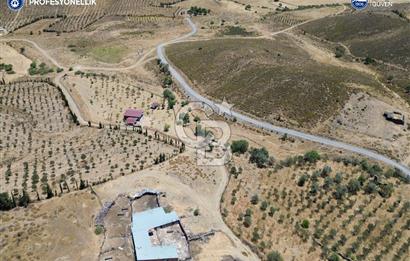 Karaburun Parlak Köyü'nde Numaratajlı Kargir Ev ve Bahçesi