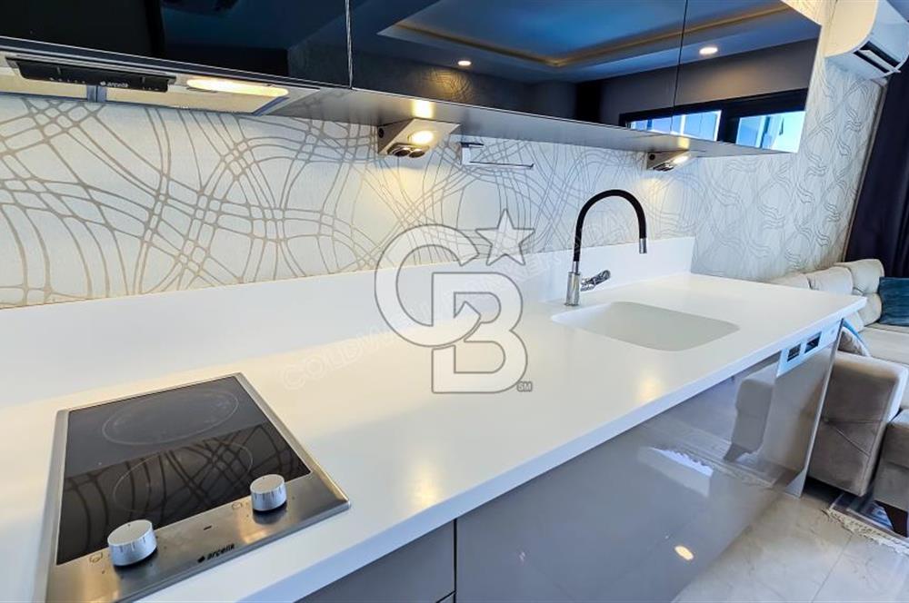 Kuşadası Kadınlar Denizinde full eşyalı Kiralık 1+1 rezidans