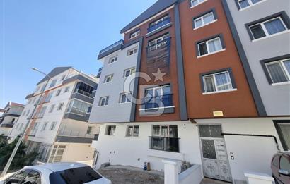 ALSANCAK MAH.DE MERKEZİ KONUM ARA KAT GÜNEYDOĞU CEPHE 2+1 DAİRE