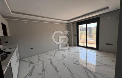 İSKELE MAHALLESİNDE LÜKS BAHÇE KULLANIMLI 1+1 DAİRE