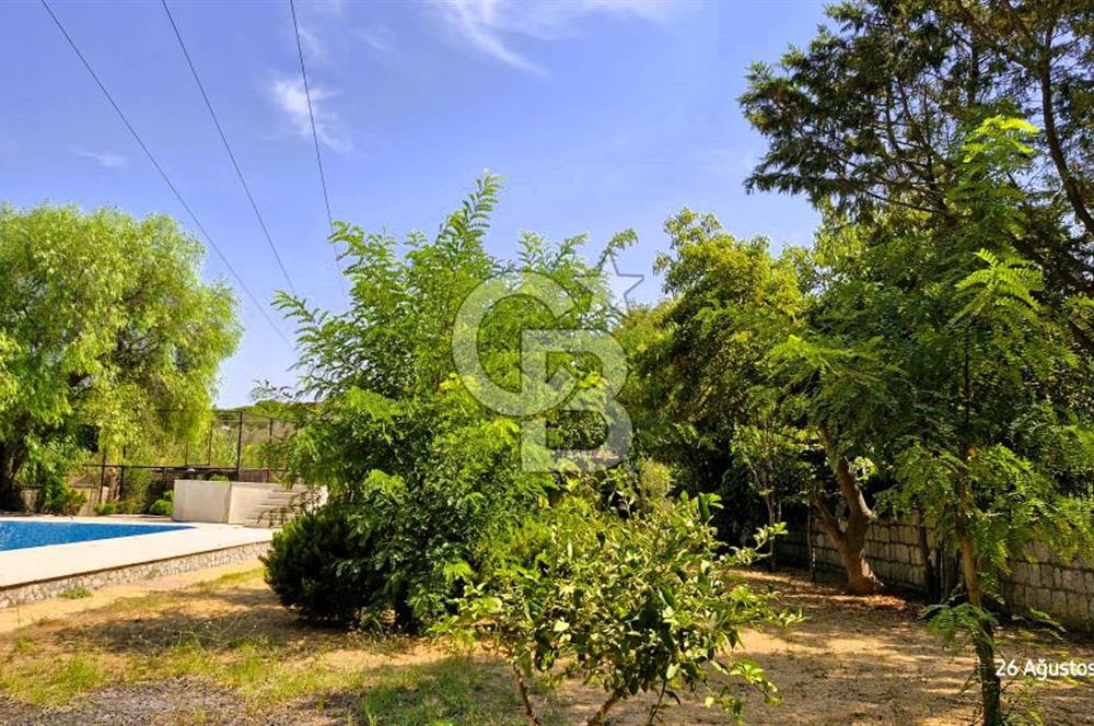 A CORNER OF HEAVEN IN THE KALABAK OF URLA, A HOUSE IN A FIELD