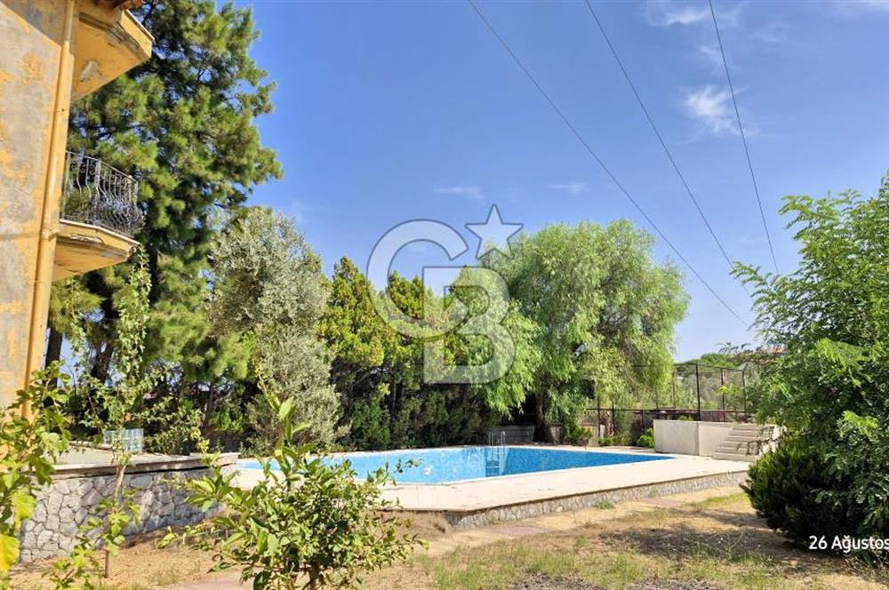 A CORNER OF HEAVEN IN THE KALABAK OF URLA, A HOUSE IN A FIELD