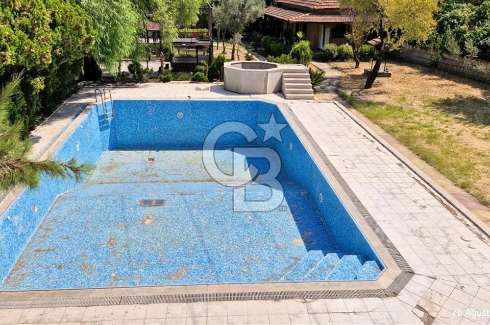 A CORNER OF HEAVEN IN THE KALABAK OF URLA, A HOUSE IN A FIELD