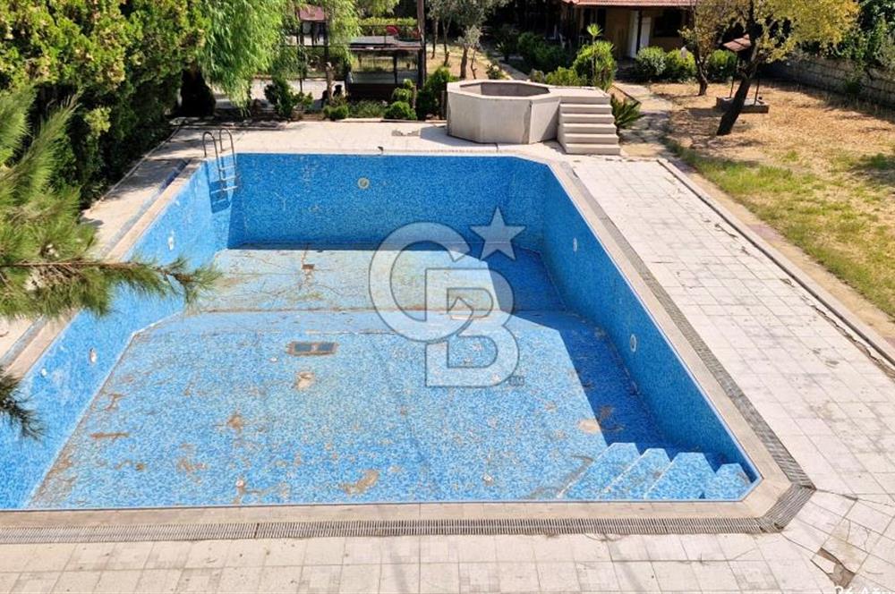 A CORNER OF HEAVEN IN THE KALABAK OF URLA, A HOUSE IN A FIELD