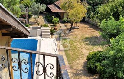 A CORNER OF HEAVEN IN THE KALABAK OF URLA, A HOUSE IN A FIELD