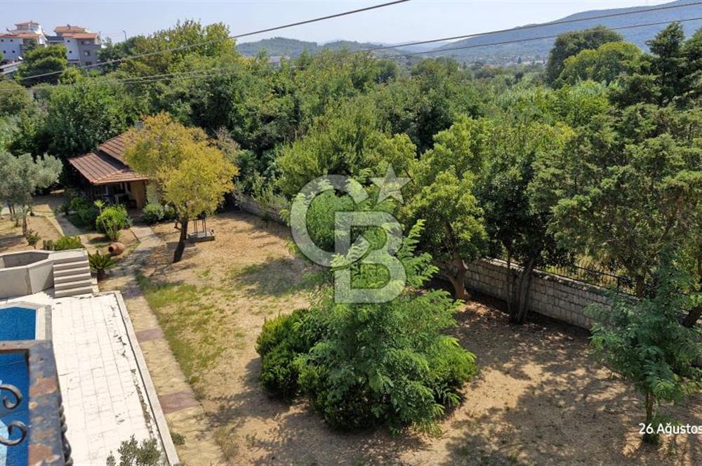 A CORNER OF HEAVEN IN THE KALABAK OF URLA, A HOUSE IN A FIELD