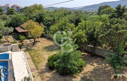 A CORNER OF HEAVEN IN THE KALABAK OF URLA, A HOUSE IN A FIELD