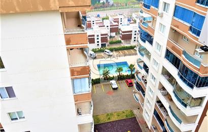 Bayraklı Yüzme Havuzlu Sitede Deniz Manzaralı 3+1 Satılık Daire