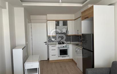 CB LOFT'TAN ORTACA MERKEZDE EŞYALI 1+1 SATILIK DAİRE