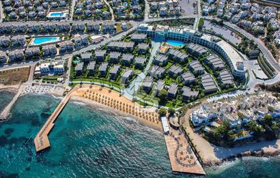 Bodrum T.reis Swissotel'de Denize sıfır bahçeli satılık villa