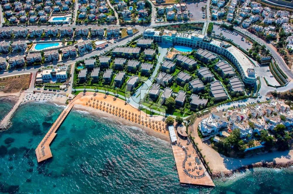 Bodrum T.reis Swissotel'de Denize sıfır bahçeli satılık villa