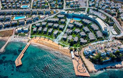 Bodrum T.reis Swissotel'de Denize sıfır bahçeli satılık villa