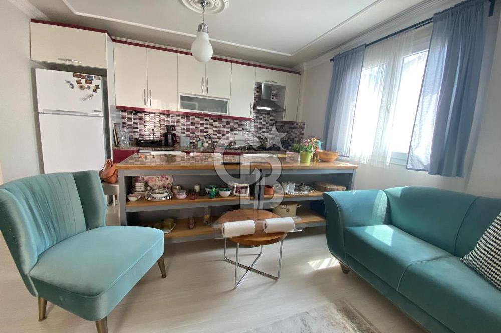 ÜRKMEZ MERKEZDE SATILIK GENİŞ 1+1 MASRAFSIZ DAİRE