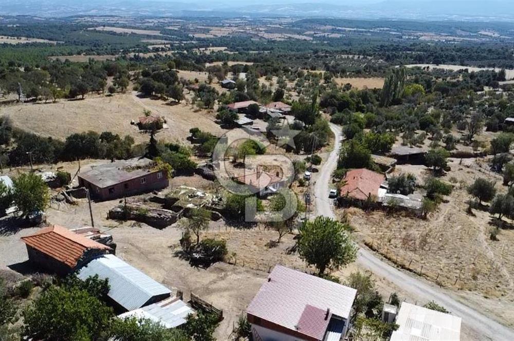 Bayramiç Palamutoba köy içinde evi bulunan satılık arsa 3755 m2