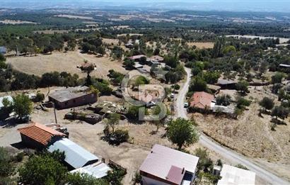 Bayramiç Palamutoba köy içinde evi bulunan satılık arsa 3755 m2