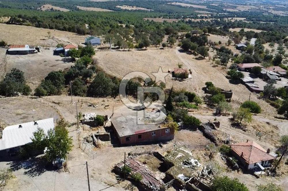 Bayramiç Palamutoba köy içinde evi bulunan satılık arsa 3755 m2