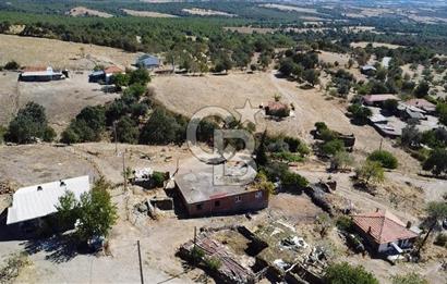 Bayramiç Palamutoba köy içinde evi bulunan satılık arsa 3755 m2