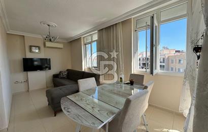 Çandarlı merkezde Stadyum Cadde üstünde ferah 2+1  eşyalı daire