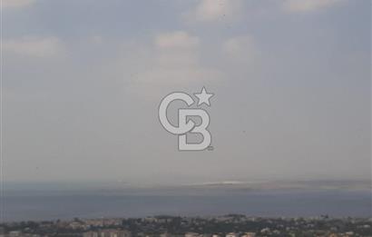 NARLIDERE MAVİSU EVLERİ'NDE SATILIK PANORAMİK DENİZ MANZARALI  3+1 DELUX DAİRE