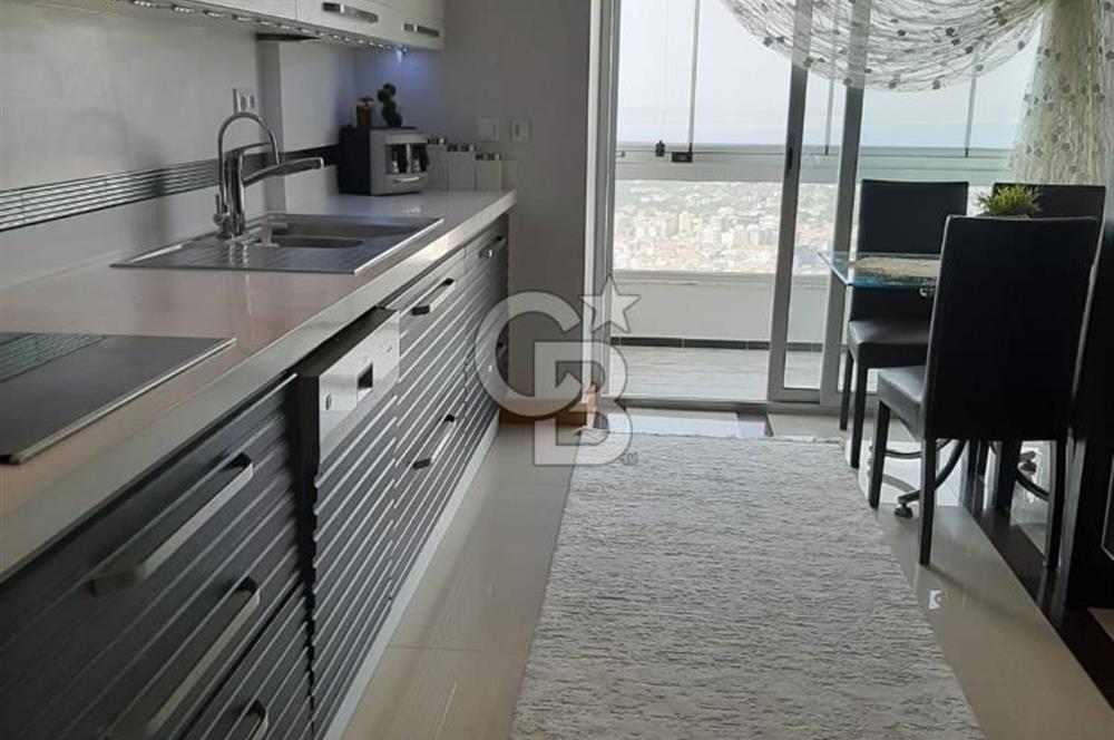NARLIDERE MAVİSU EVLERİ'NDE SATILIK PANORAMİK DENİZ MANZARALI  3+1 DELUX DAİRE