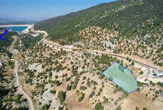 ANTALYA KAŞ KEMER (SİNEKÇİ)'DE YATIRIM FIRSATI SUNAN SATILIK TARLA