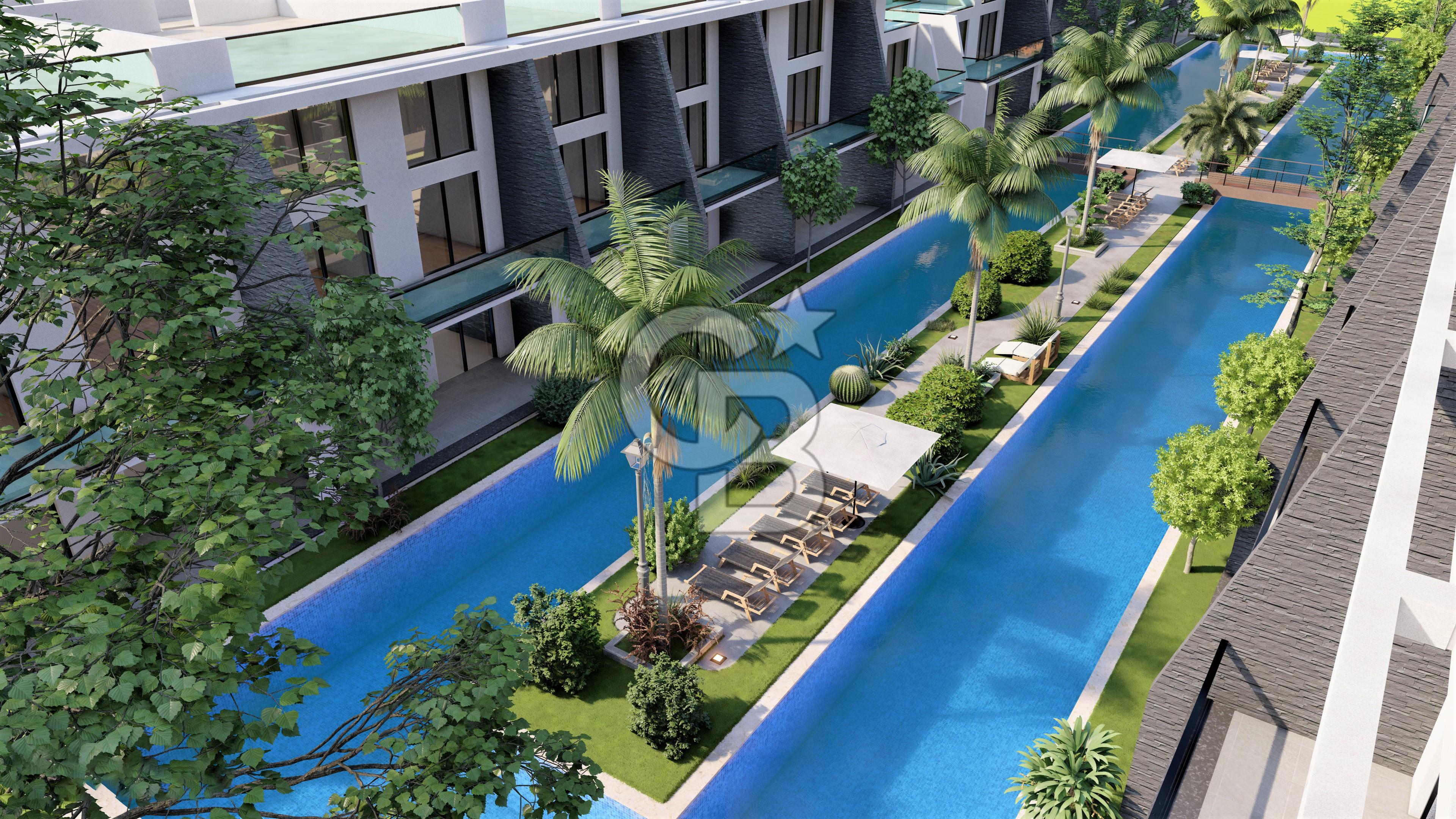 Kıbrıs İskele Long Beach Bölgesinde Site İçerisinde Satılık Bahçe Katlı Ve Çatı Teraslı 1+1 Daireler