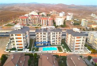 SEFERİHİSAR CAMİKEBİR'DE HAVUZLU SİTEDE SATILIK 3+1 DAİRE