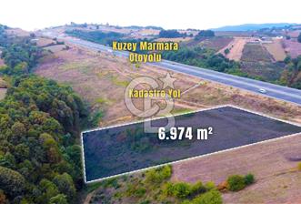 CB AKADEMİ İZMİT SÜLEYMANİYE'DE SATILIK YOLA CEPHE 6974 m² TARLA