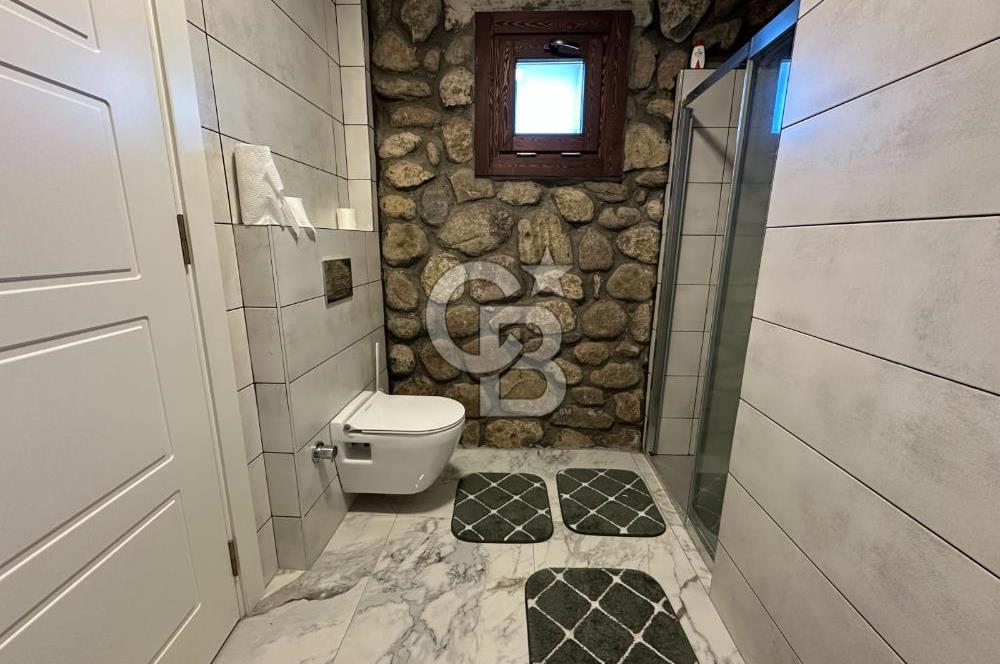 Urla İçmeler'de Denize Nazır Müstakil Havuzlu Satılık Taş Villa