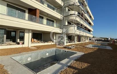 PRİVATUS AYVALIK OLİVA MARE' de denize sıfır 1+1 daireler