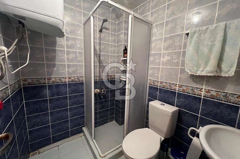 GEYİKLİ ODUNLUK İSKELESİ MENEKŞE TATİL SİTESİNDE SATILIK SUİT DAİRE