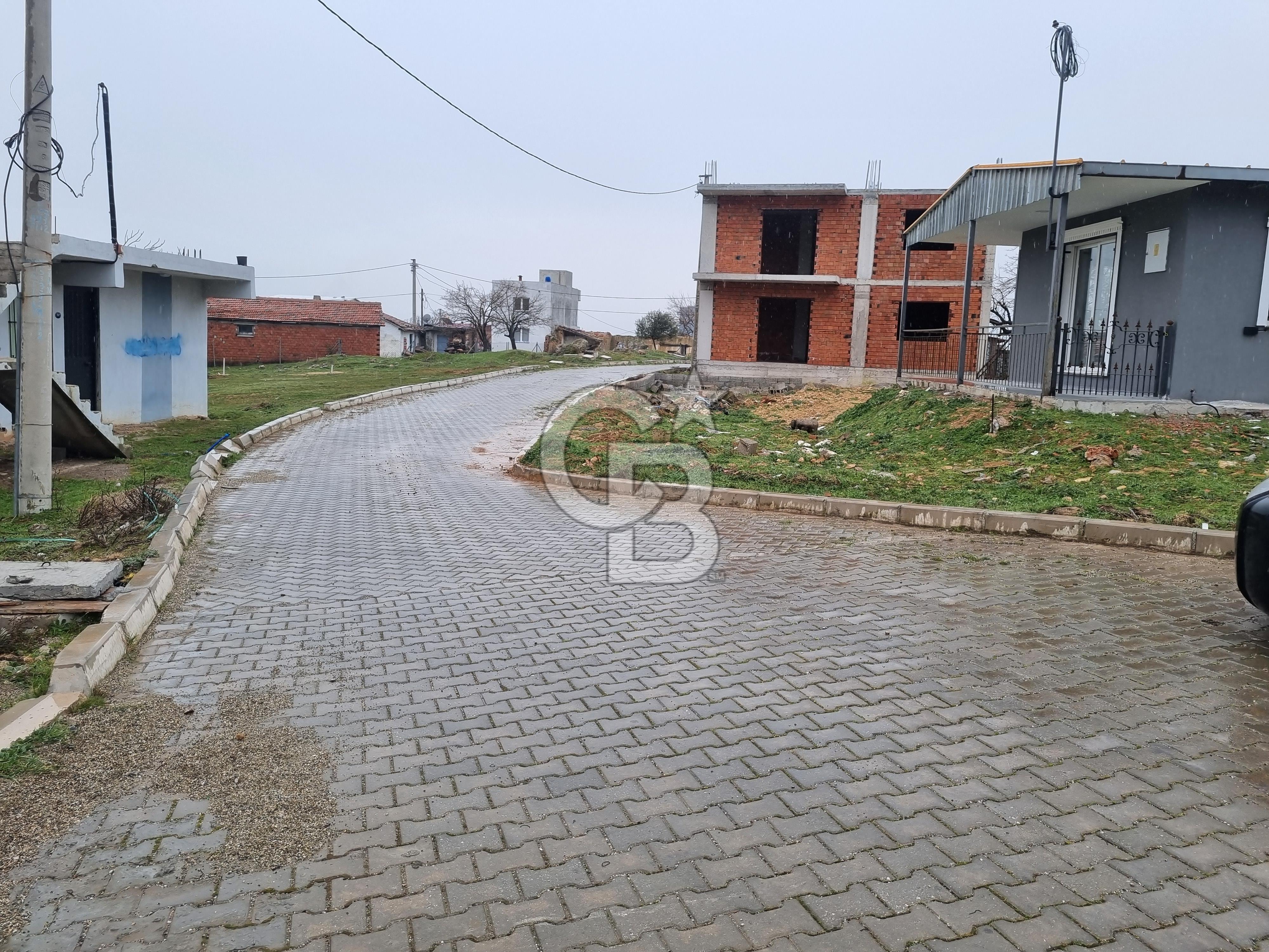 KEMALPAŞA SÜTÇÜLER MAHALLESİ'NDE KÖYİÇİ İMARLI SATILIK ARSA